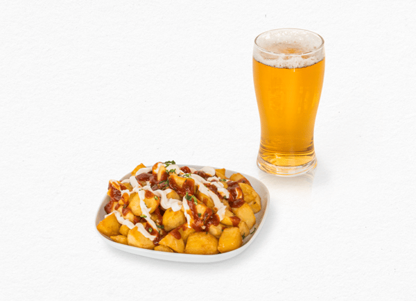 Patatas bravas and a drink