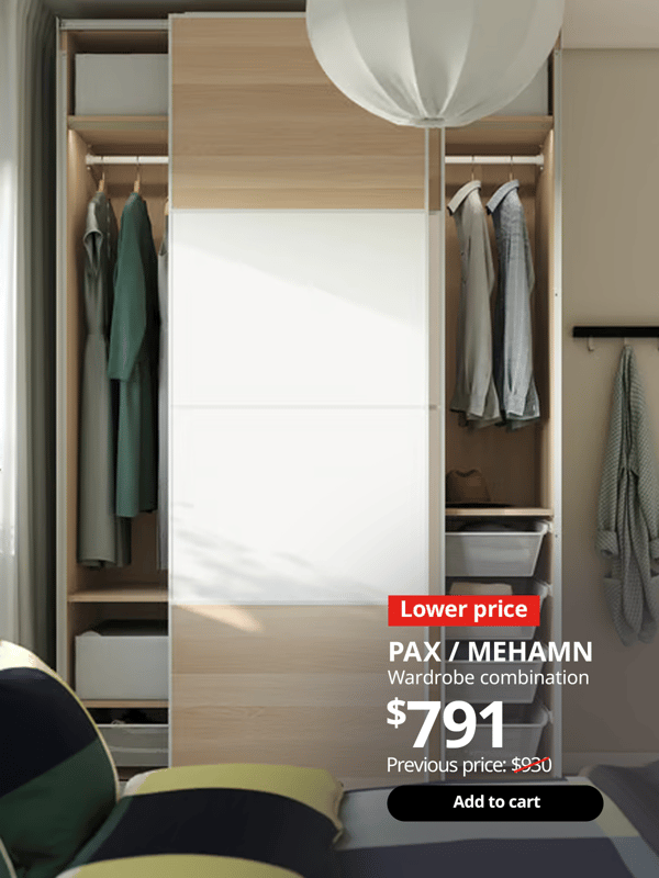 PAX wardrobe in bedroom with MEHAMN sliding doors. 