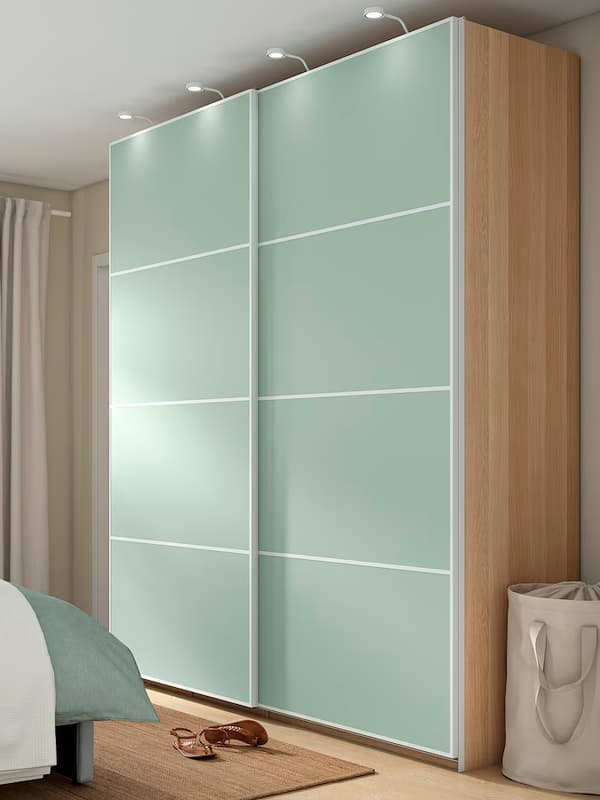 PAX wardrobe with green doors