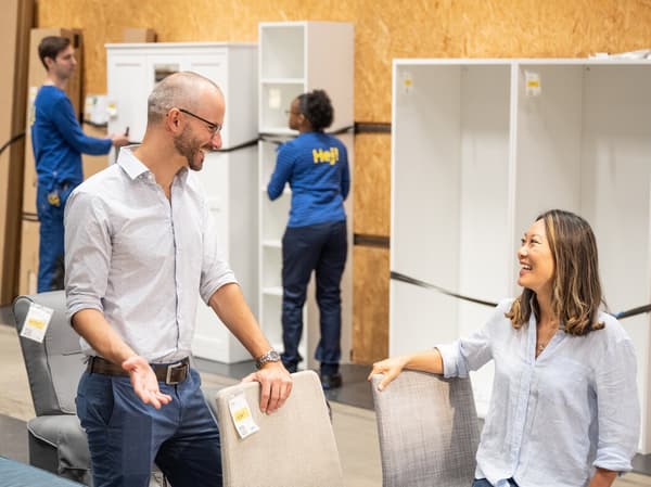 People at a Re-shop and Re-use smiling