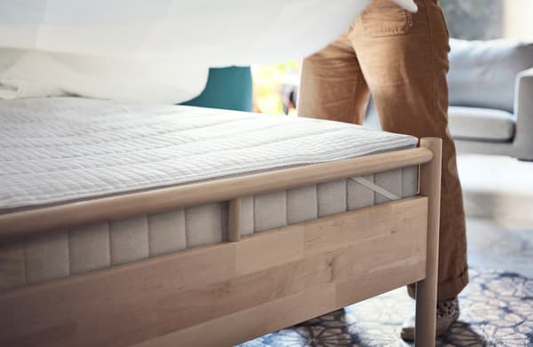 Person about to clean a mattress