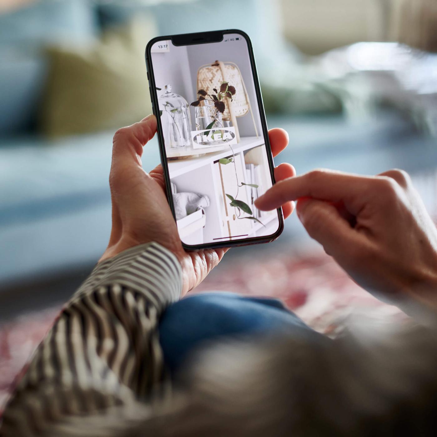 person scrolling on phone