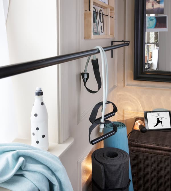 Personalize your workout space and boost motivation! Create a wall collage so that you are surrounded by the things you love. Try IKEA YPPERLIG wall shelf in solid birch.
