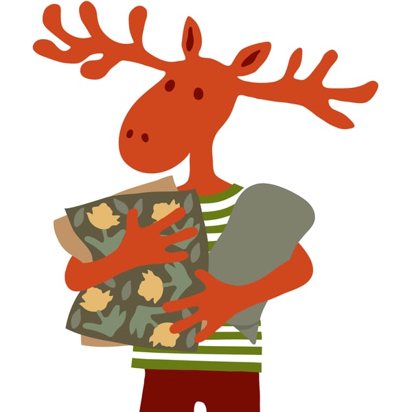 Petákot látjuk, aki egy takarót és néhány díszpárnát tart a kezében.