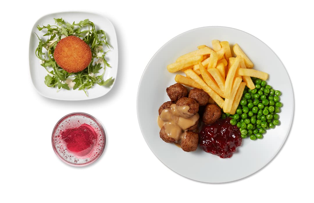 Photo du menu du mardi composé d'une croquette au fromage, d'une assiette de 8 boulettes suédoises et d'une boisson.