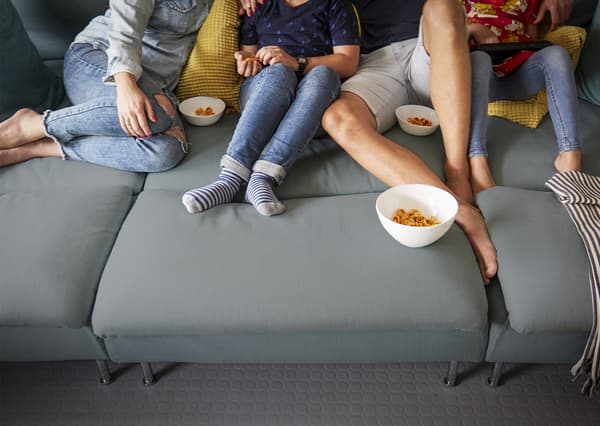 Pia’s family on the sofa in the playroom.