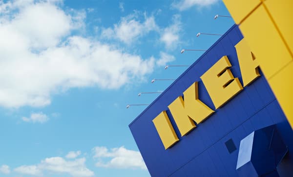 Picture of the facade of an IKEA Store with blue sky in the background