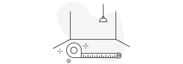 Piktogram på mättband och lampa i ett tomt rum