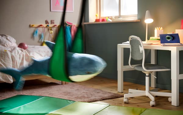 Placing a swing beside your child’s desk is a concrete way to make the switch between activity and work flow easy.