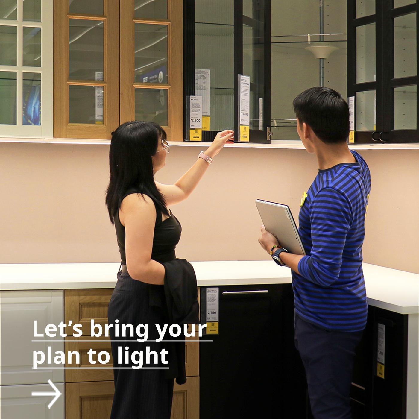 Plan and Order Shop - Co-worker and customer collaborating and discussing about planning kitchen cabinets