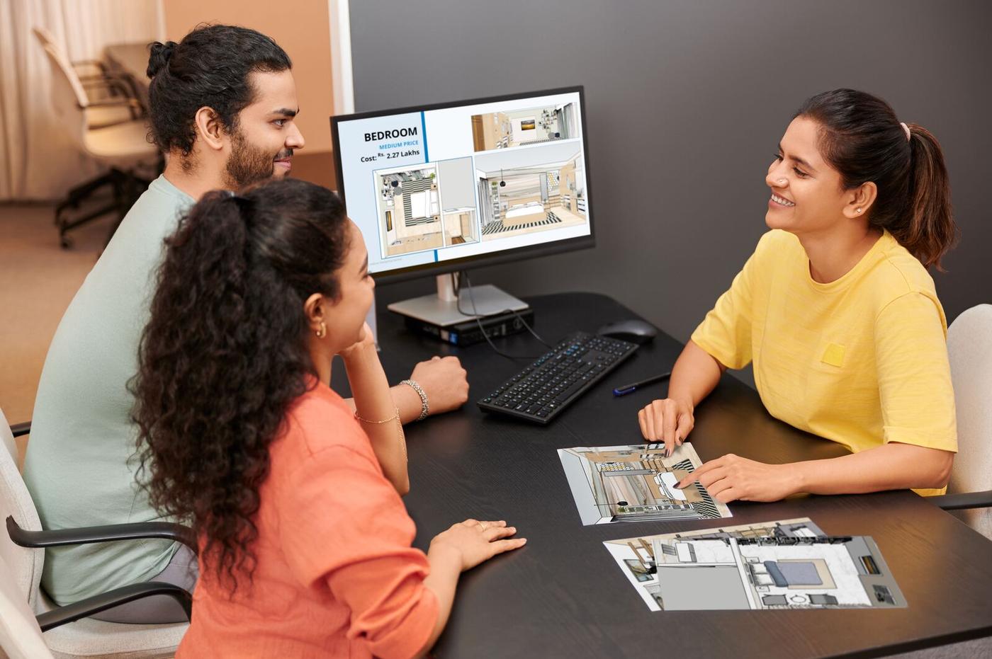 Planner talking to customers 