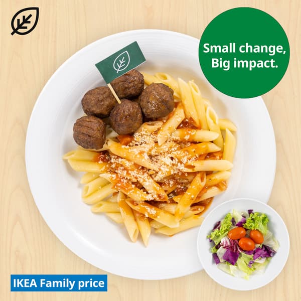 Plant ball with organic penne and green salad. Plant food symbol at top left corner of thumbnail and sustainability message 