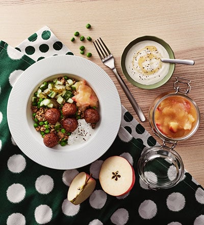 Plant balls with grains, green peas, apple compote and honey sour cream
