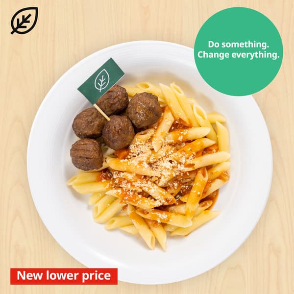 Plant balls with organic penne paste in tomato sauce with grated parmesan cheese. Plant food symbol at the top left corner of the thumbnail and sustainability message 