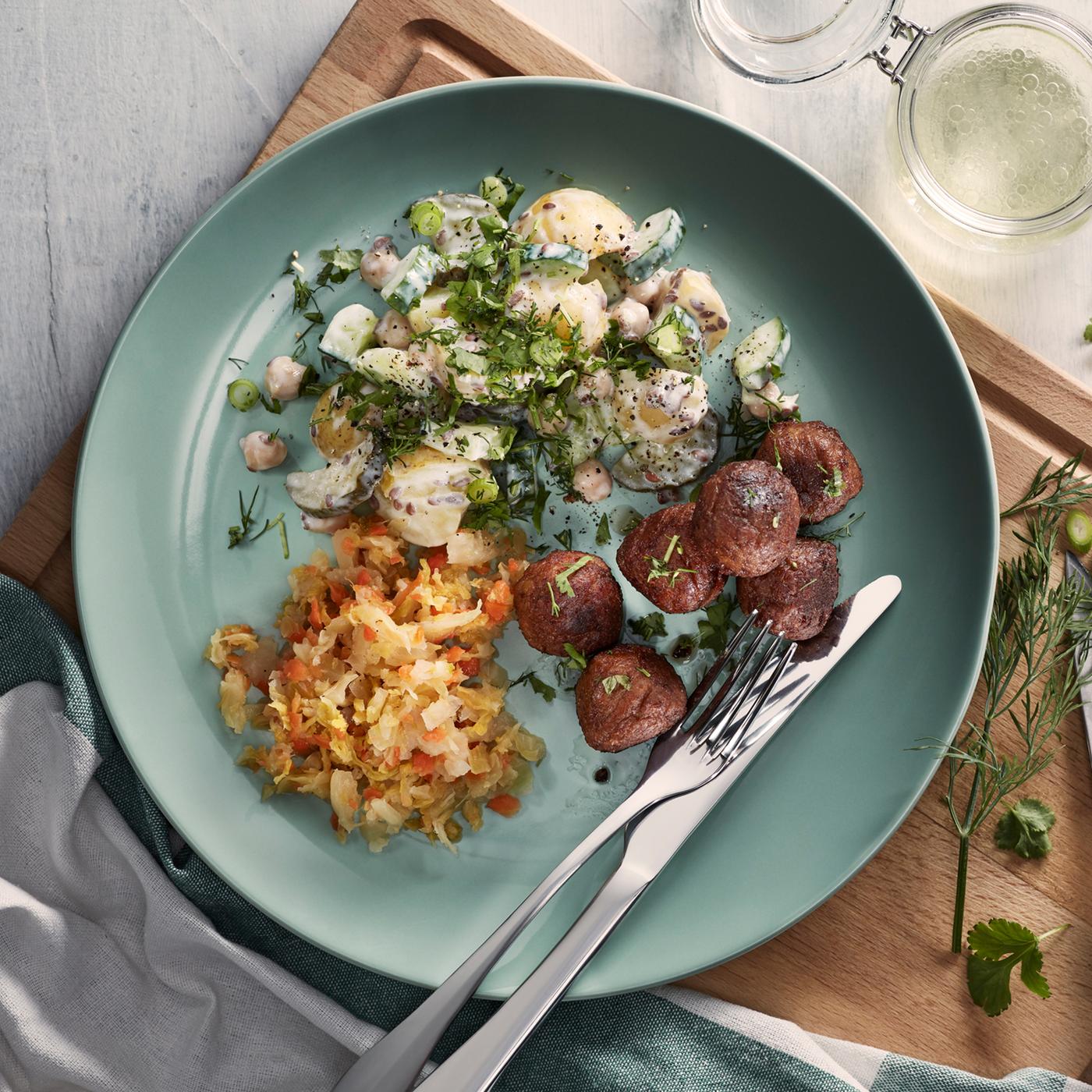 Plant balls with potato salad and kimchi.