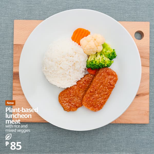Plant-based luncheon meat with rice and veggies in a clean white plate placed in a wooden board featured as part of new menu for IKEA Swedish Restaurant in Pasay City priced at P85 only.