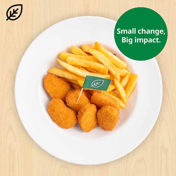Plant-based pieces with fries, with plant food symbols at top left corner. A green sustainable tag is on the top right hand corner of the dish that reads 