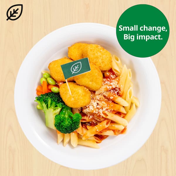 Plant-based pieces with organic penne pasta with tomato sauce, with plant food symbols at top left corner. A green sustainable tag is on the top right hand corner of the dish that reads 
