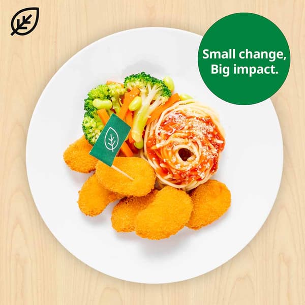 Plant-based pieces with organic spaghetti with tomato sauce, with plant food symbols at top left corner. A green sustainable tag is on the top right hand corner of the dish that reads 