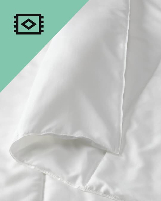 Plumones blanco para la cama