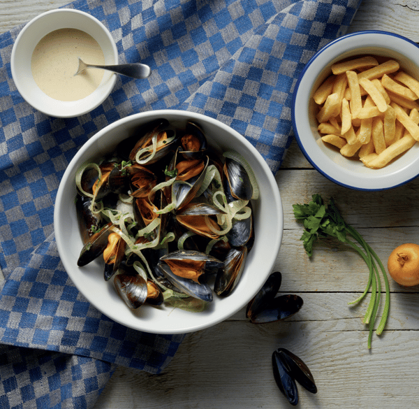 Portion of mussels on a table