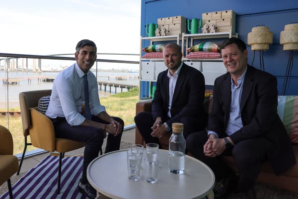 Prime Minister Rishi Sunak; Jakob Bertilsson, Country Customer Fulfilment Manager, IKEA UK, and;  James Wroath, CEO, Wincanton, sitting in a sofa and armchair