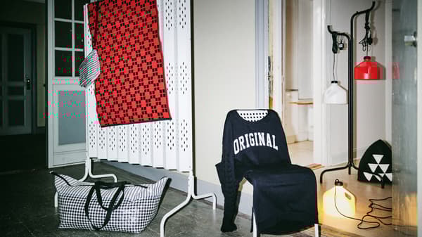 Products from the SAMMANKOPPLA collection; a room divider, chair cover, multi-use lighting items, a hat and coat stand.