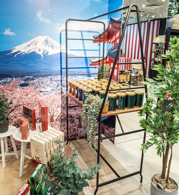 Products showcased on a HÅVERUD table with storage ladder.