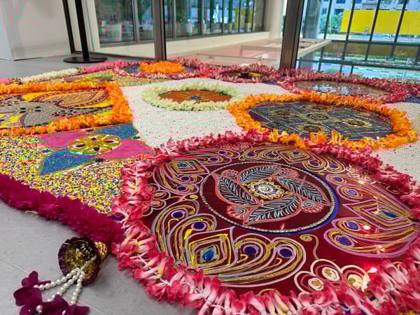 Rangoli art in the store floor 