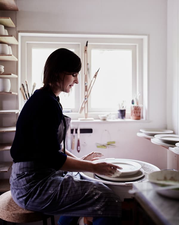 Rebecca at her potter’s wheel.