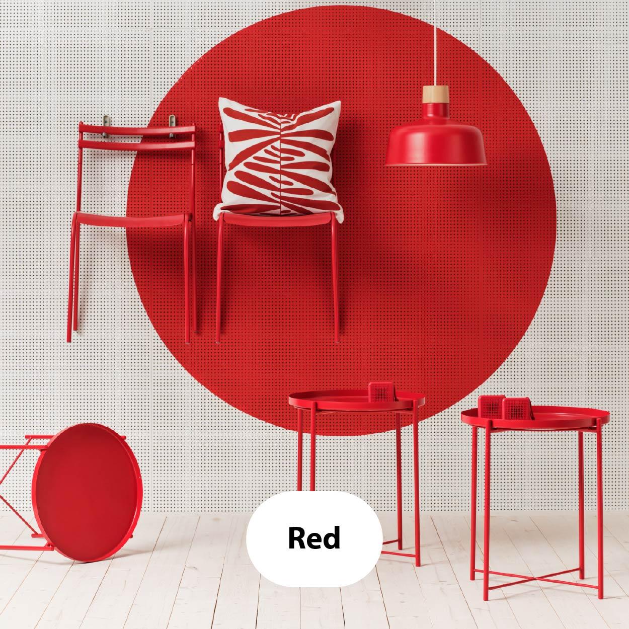 Red – Bold interior with bright red circular wall feature, red chairs, tables, lamp, and patterned cushion against a white grid background.