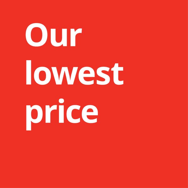 Red promotional banner with large white text reading “Our lowest price”, presenting a bold retail offer with a clean, minimalist design.