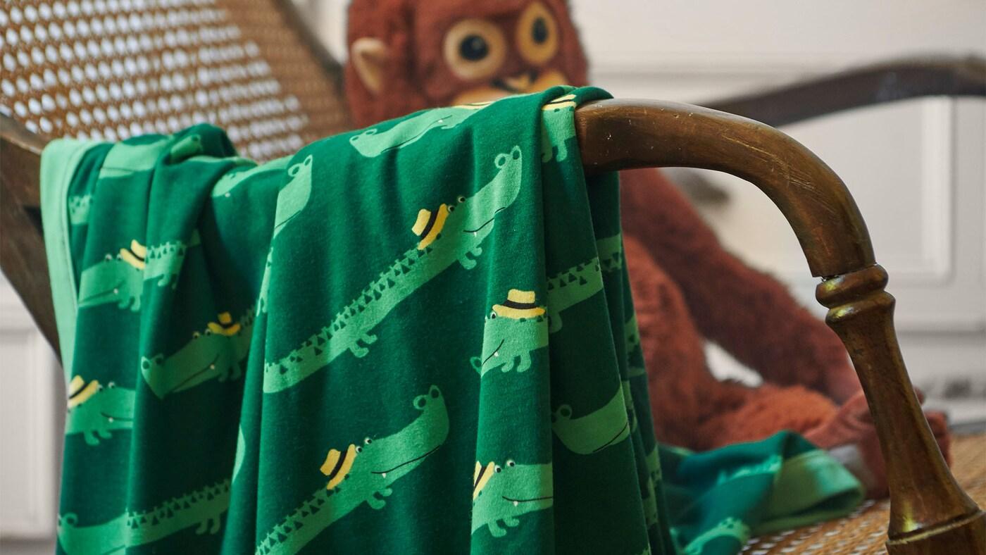 RÖRANDE crocodile/green blanket.