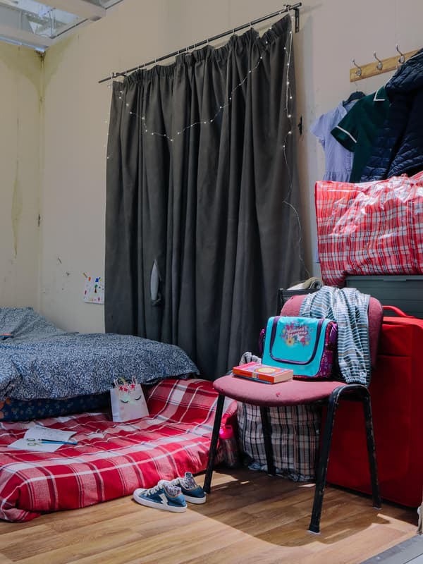 Roomset showing poor living conditions of thousands of families in IKEA Hammersmith.