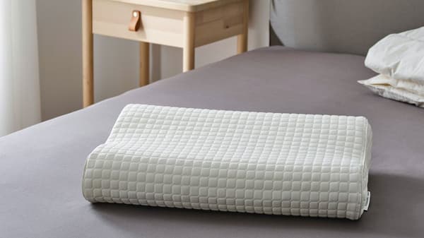 ROSENSKÄRM ergonomic pillow for side/back sleepers.