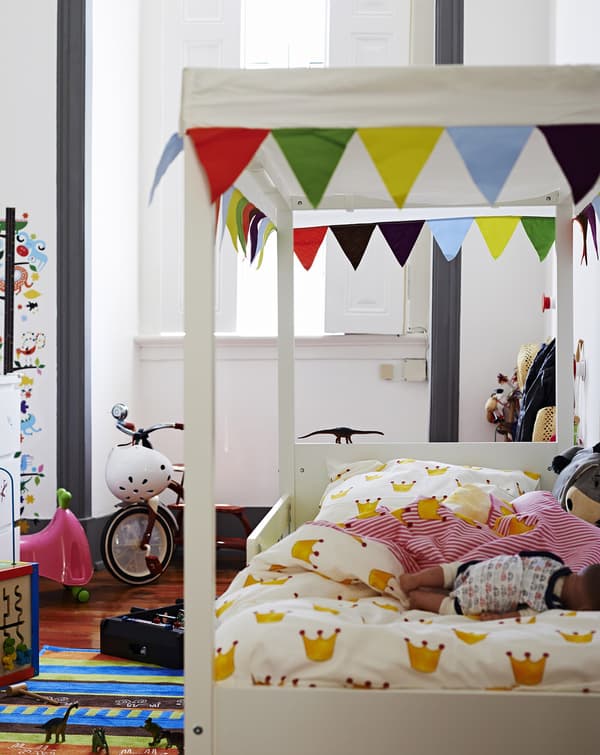 Save space with a bed that doubles as a play den.