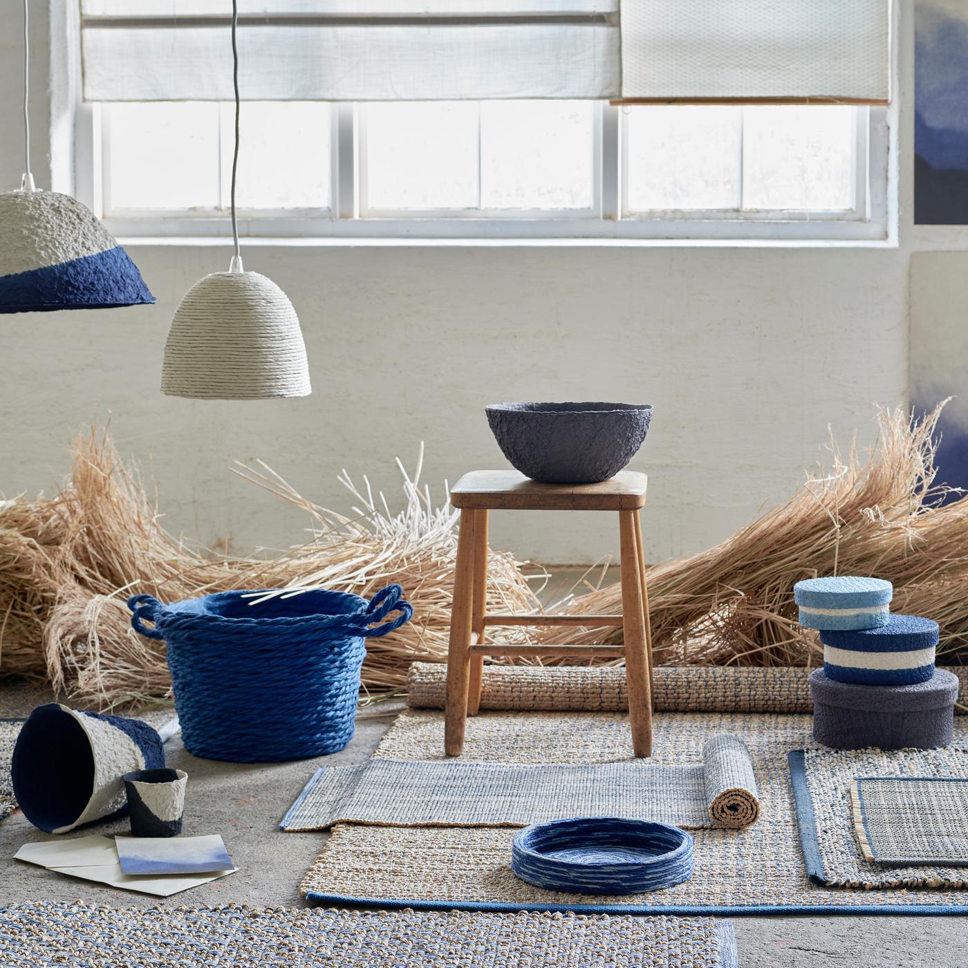 Selection of FÖRÄNDRING items in a dark room on a wooden floor.