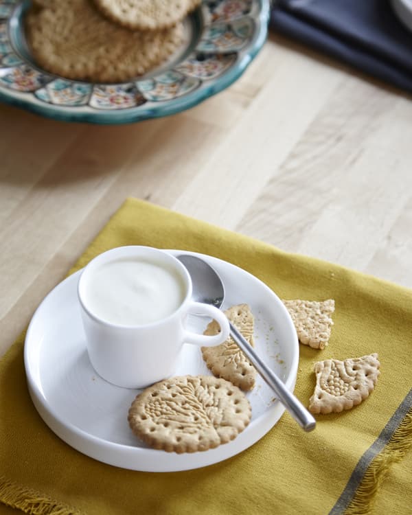 Serve the lemon mousse with biscuits for dunking.