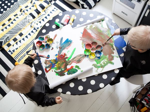 Set up a table for the children that's easy to clean.