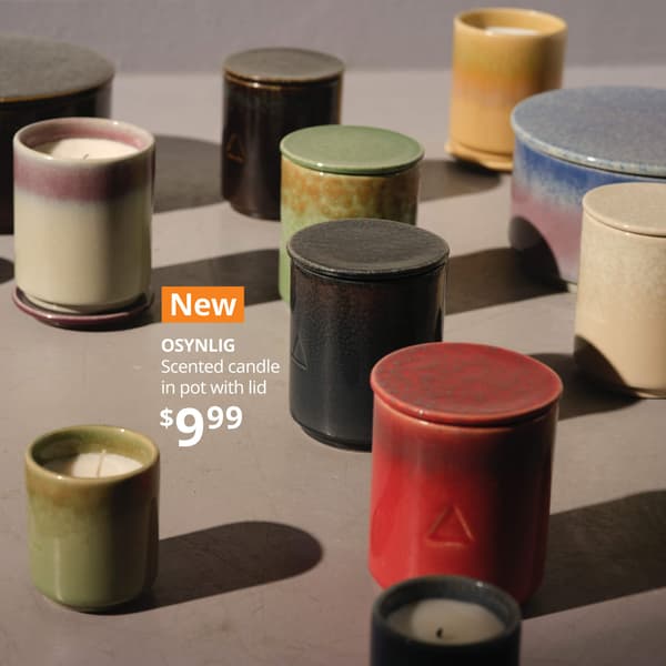 Several candles in colorful jars- New OSYNLIG Scented candle in pot with lid, $9.99.