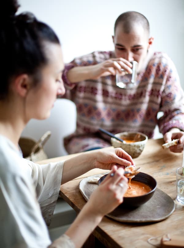 Shalony and Niclas tuck into the warming soup.