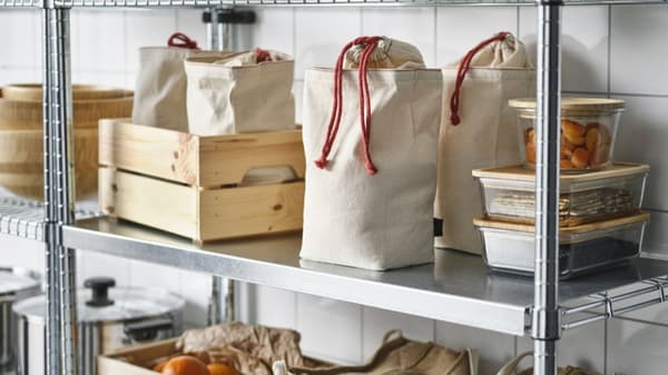 Shelves full of bagged food and food storage containers