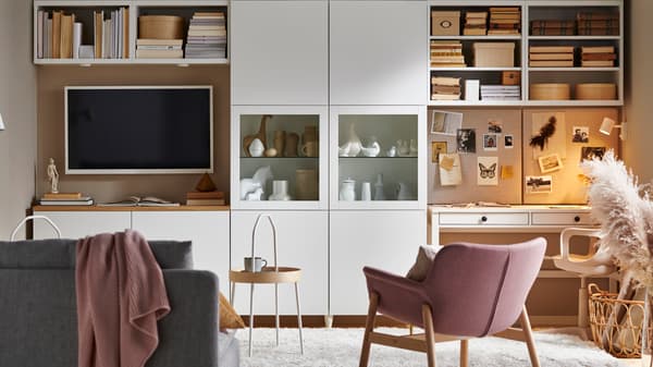 shelving, couch, and chairs in a living room
