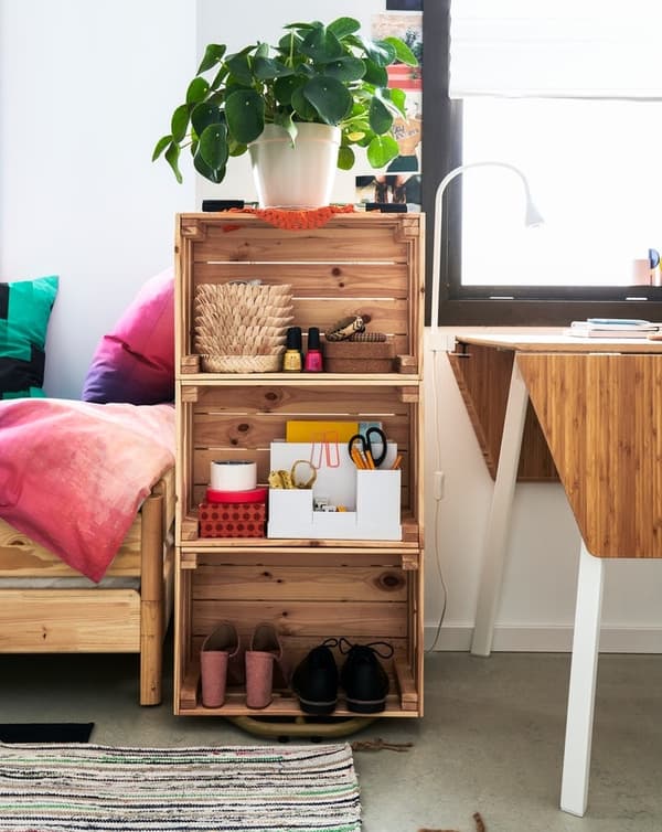 Shelving unit with re-used boxes