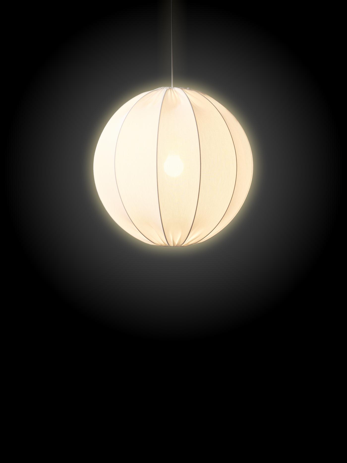 Sijoča svetilka, ki ponazarja polno luno, na temni podlagi.