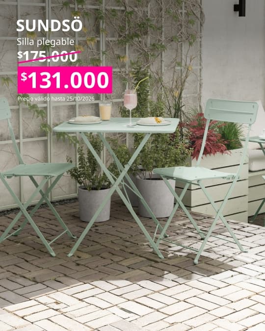 Silla plegable SUNDSÖ para exterior en color verde claro, fácil de guardar cuando no se utiliza.