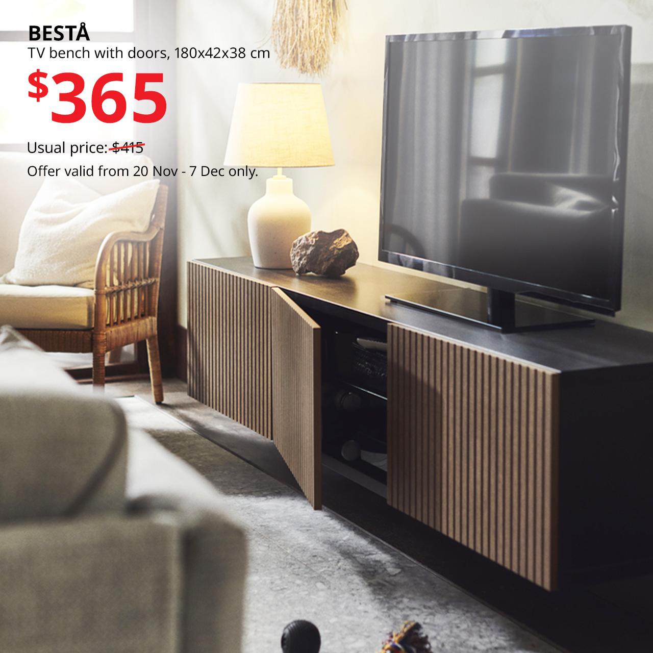 Singapore living room features BESTÅ TV bench with doors, black-brown Björköviken/brown stained oak veneer, 180x42x38 cm. Usual price $415, offer price $365.