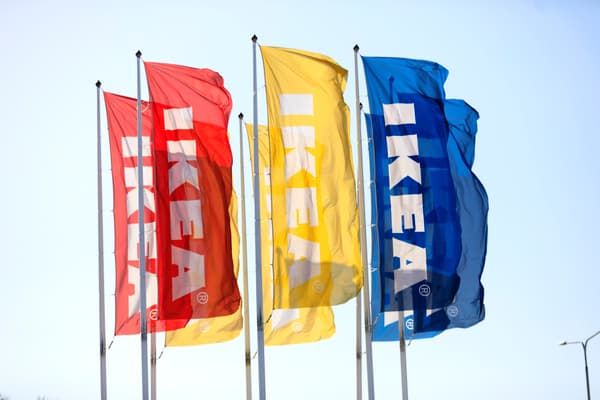 Six IKEA flags in red, yellow and blue