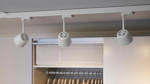 SKENINGE spotlights shining on a wardrobe