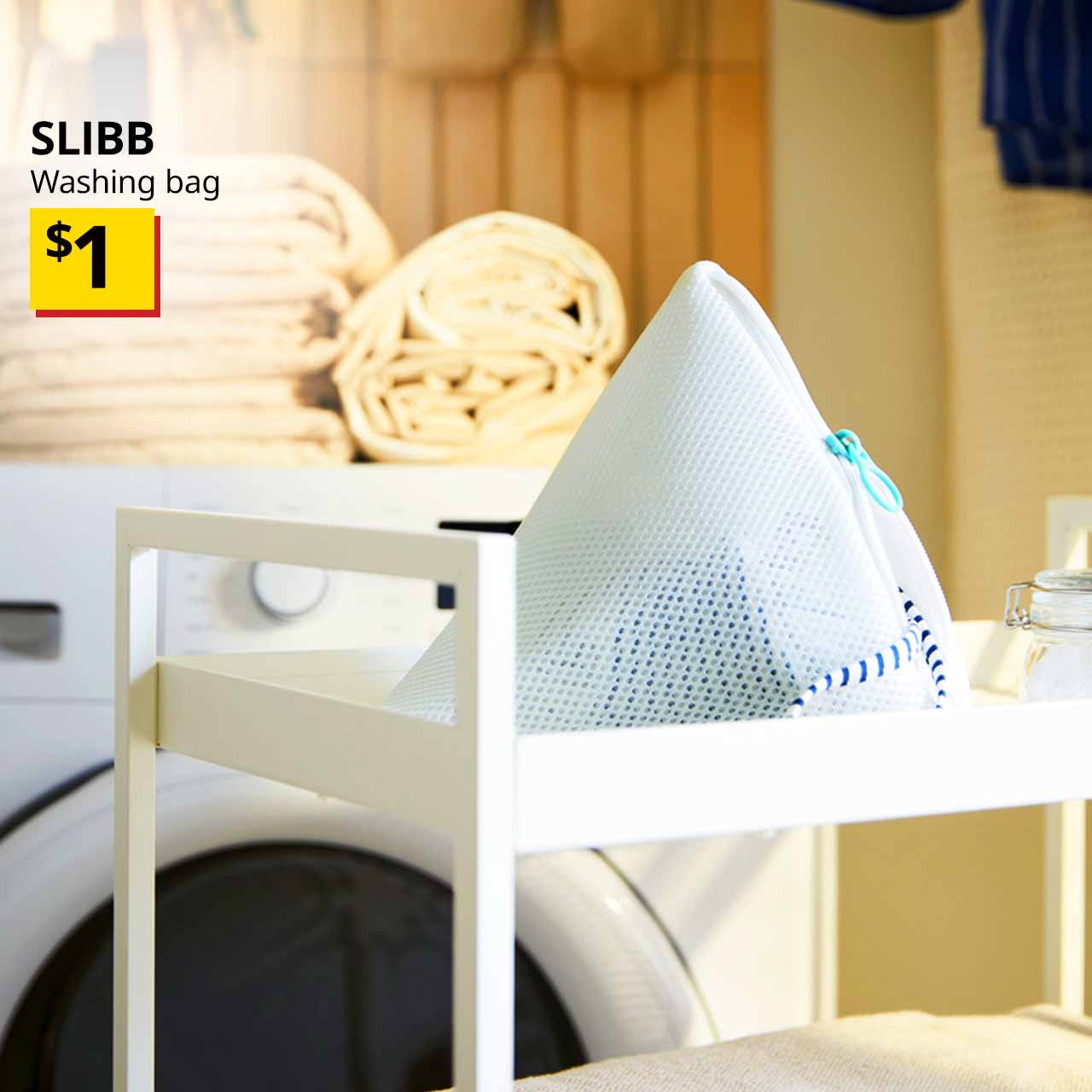 SLIBB washing bag filled with laundry in the laundry room/service yard. Price: $1.
